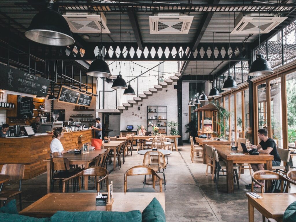 interior of rustic cafe with wooden tables