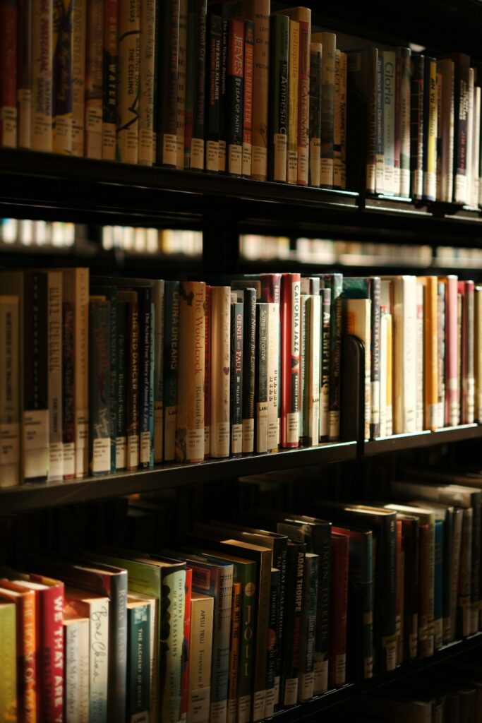 Rows of books on library shelves